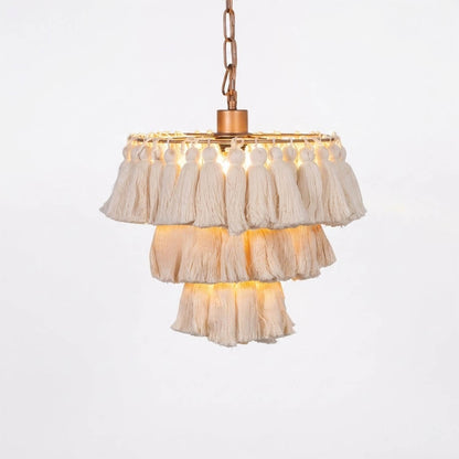 Marrakesh boho tassel pendant light fabric fringe round metal frame  white background