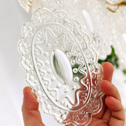 Close-up of the rippled lace-pattern glass panels on the Merletto chandelier