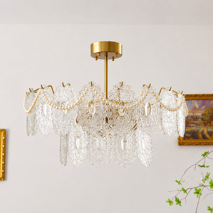 Detail of the pearl-style bead strands draped on the Merletto glass chandelier