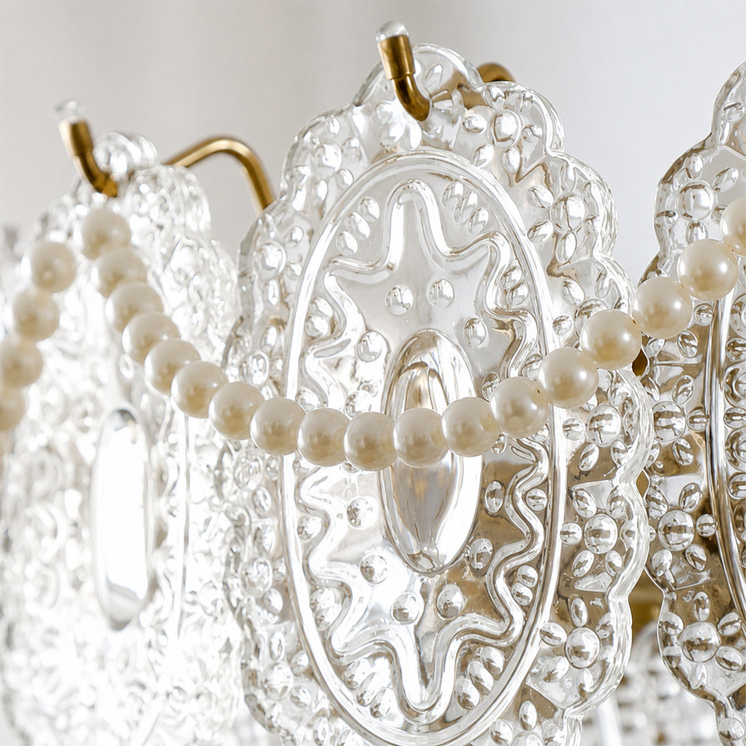 Detail of the pearl-style bead strands draped on the Merletto glass chandelier