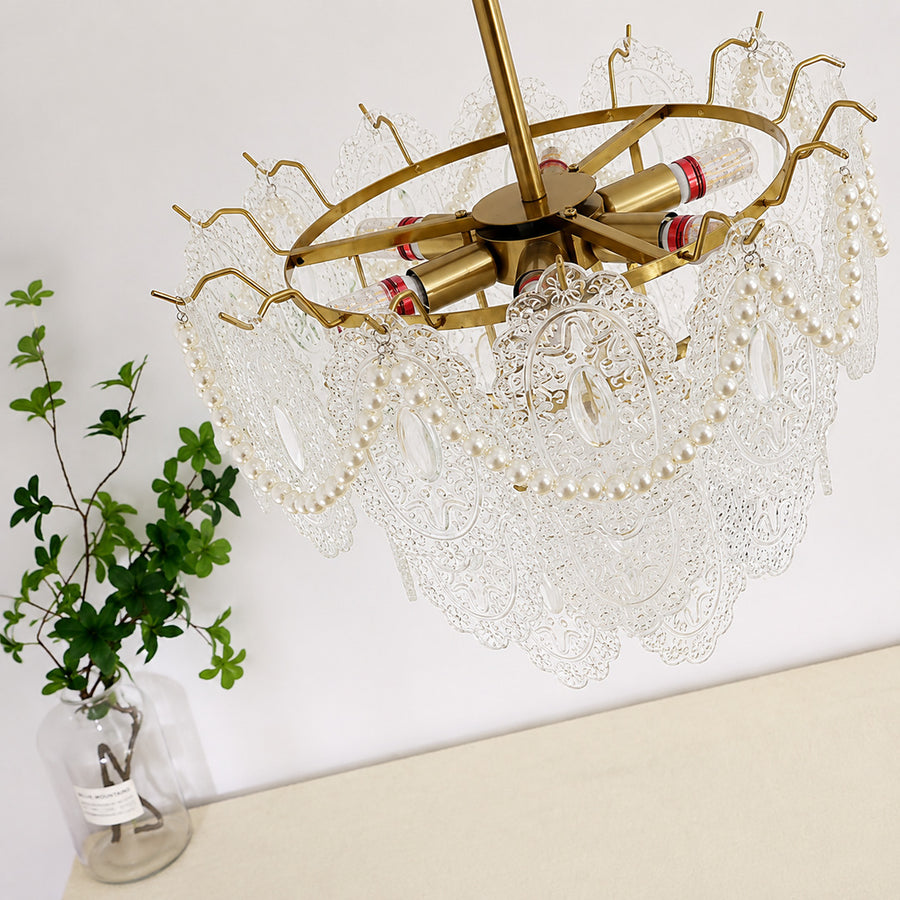 Close-up of the rippled lace-pattern glass panels on the Merletto chandelier