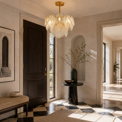 Merletto glass chandelier welcoming guests in an entryway