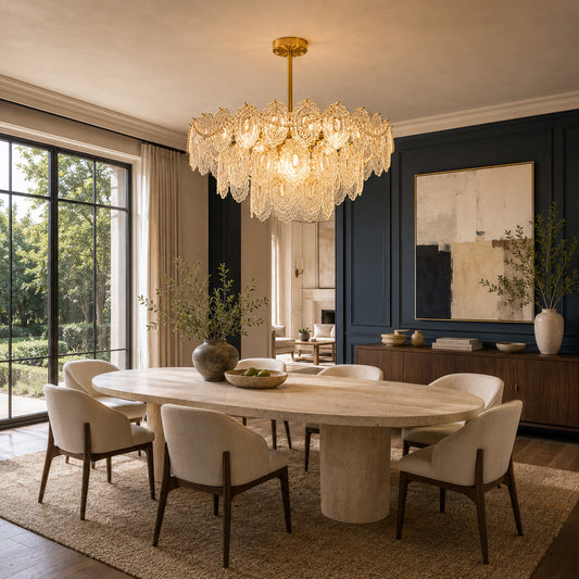 Merletto tiered glass chandelier hanging over a round dining table