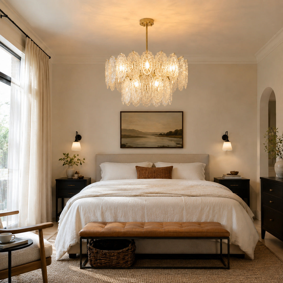 Merletto glass chandelier with pearl accents casting a dreamy glow in a bedroom