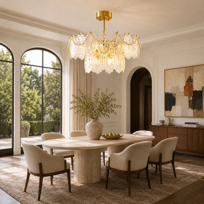 Merletto tiered glass chandelier hanging over a round dining table
