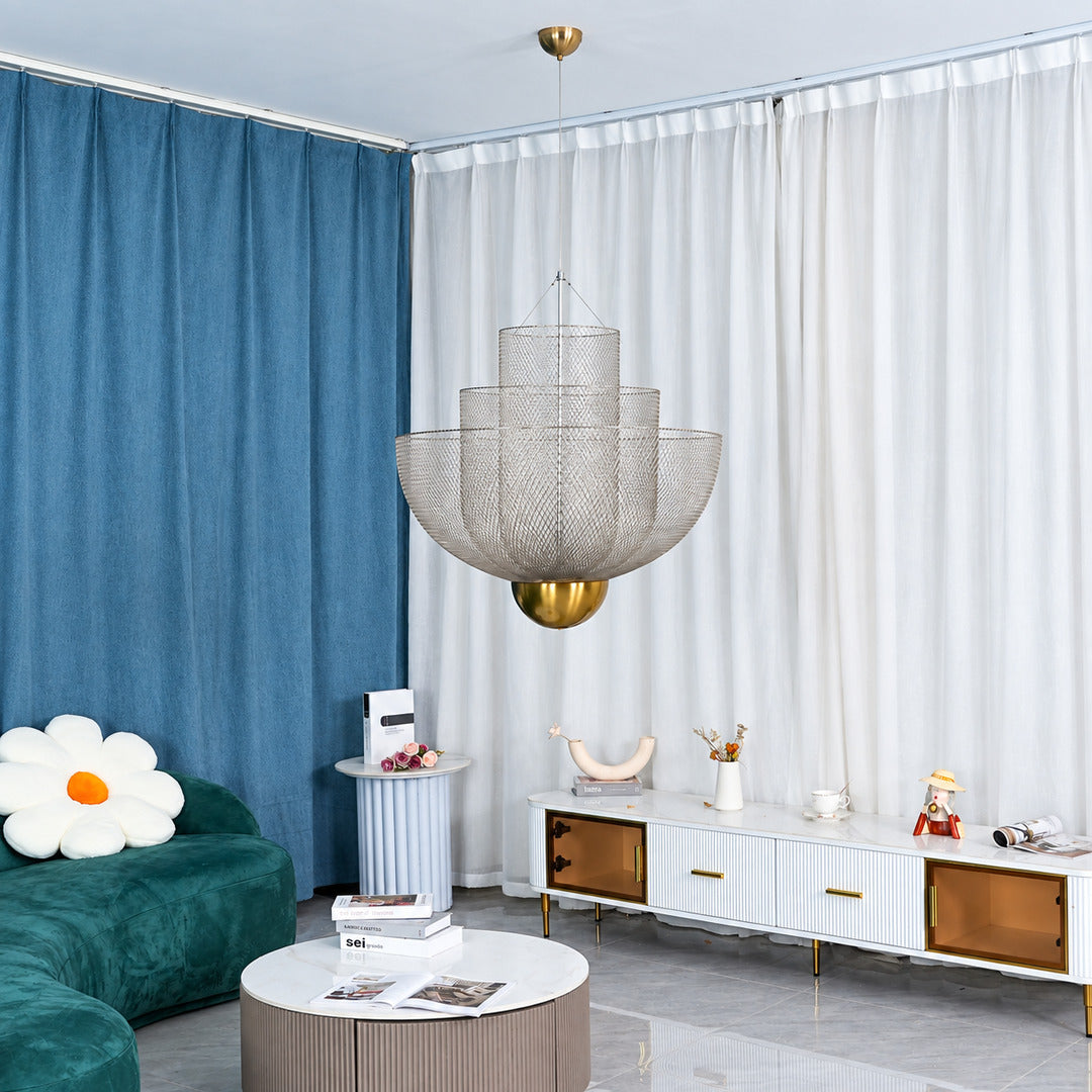 Small Meshmatics chandelier casting a warm glow over a corner reading nook