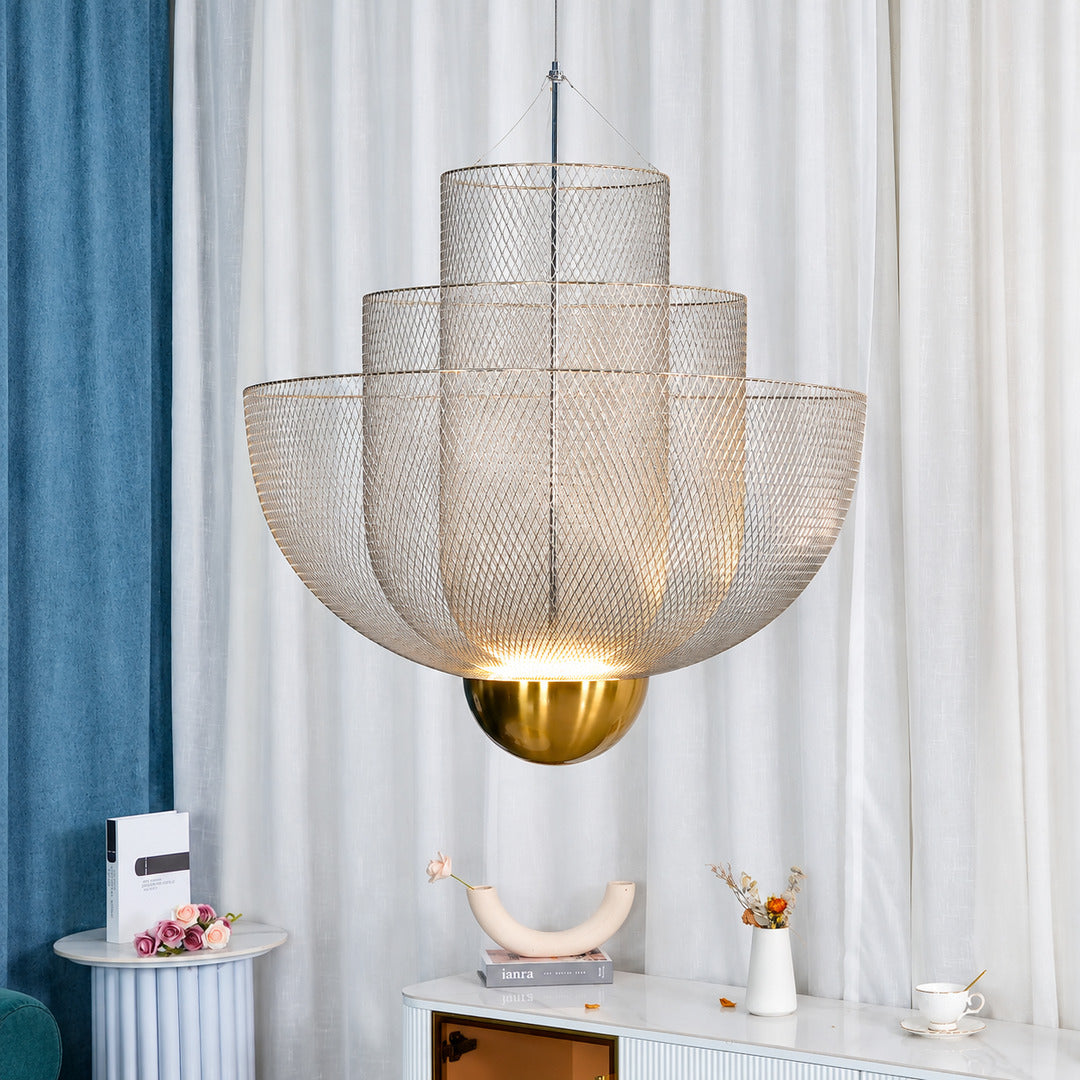 Small Meshmatics chandelier casting a warm glow over a corner reading nook