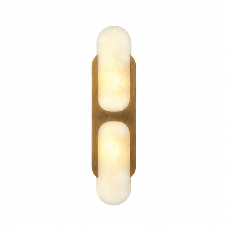 Mezzaluna alabaster wall sconce with a half-cylinder natural stone shade glowing warm on a wall