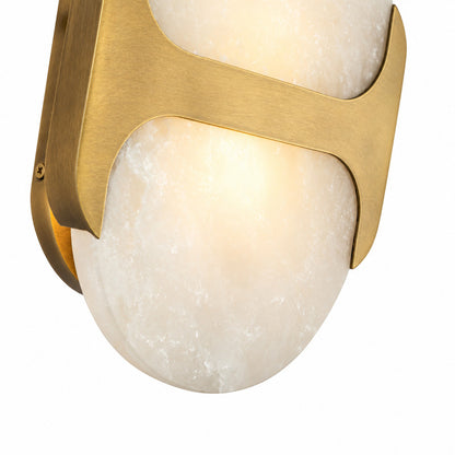 Natural veining and translucency of the alabaster shade on the Mezzaluna wall sconce, unique to each piece