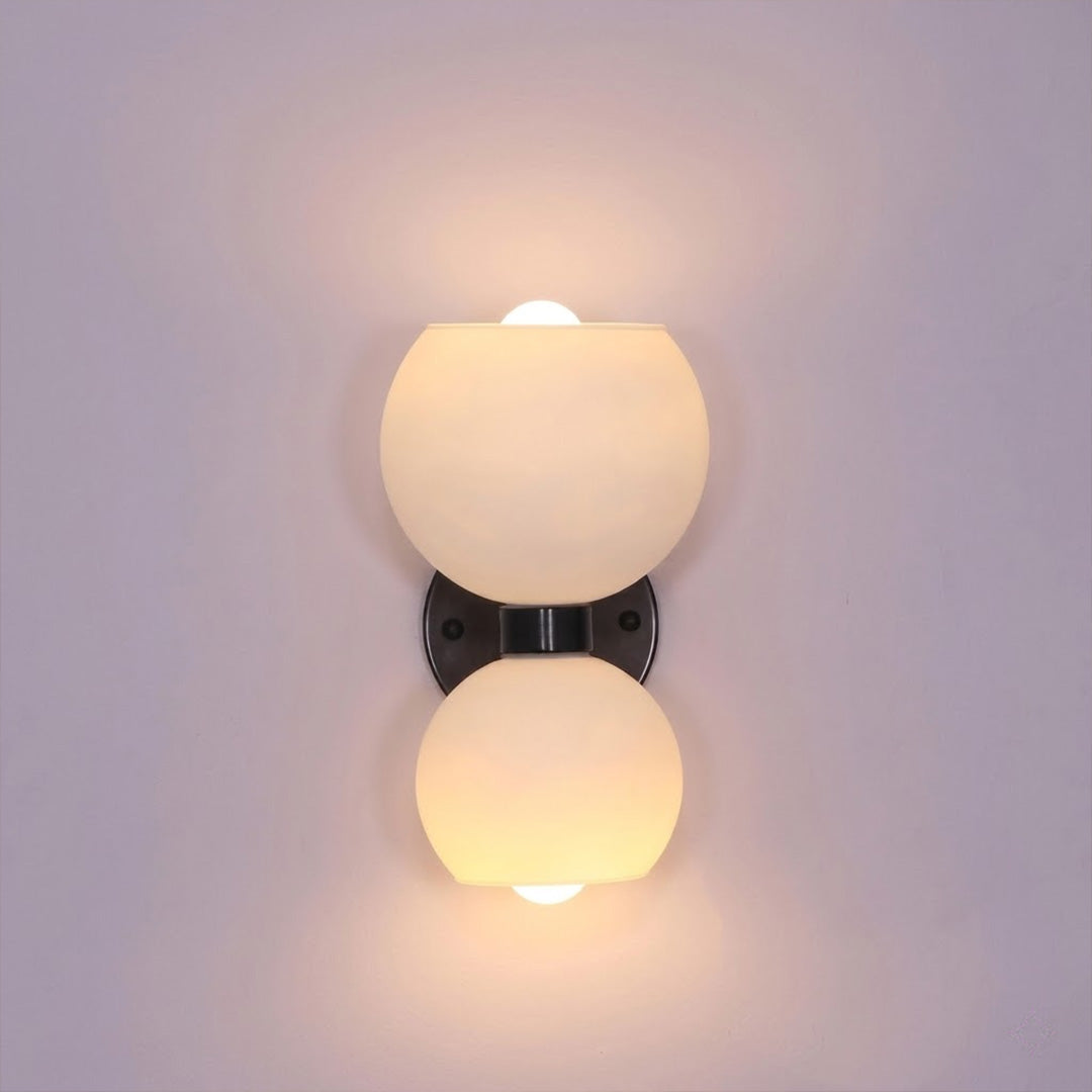 Mira wall sconce matte black arm white glass shade modern white background