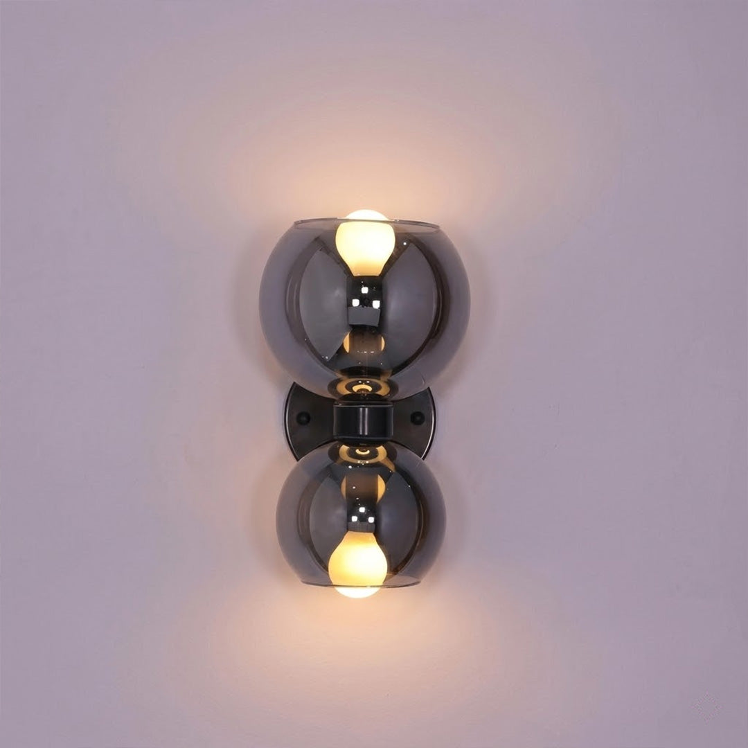 Mira wall sconce matte black arm chrome glass shade modern white background