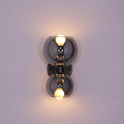Mira wall sconce matte black arm chrome glass shade modern white background