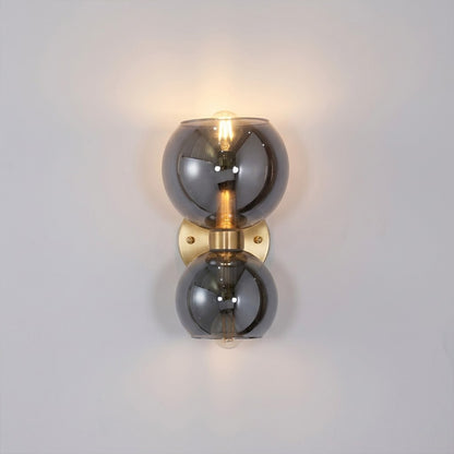 Mira wall sconce matte black arm chrome glass shade modern white background