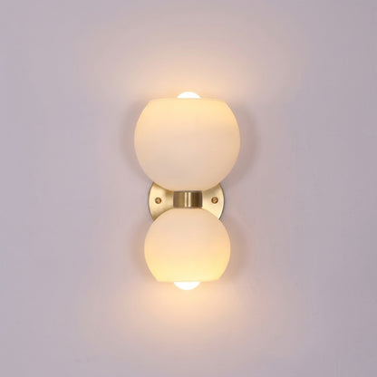 Mira mid century wall sconce brass arm white glass shade modern classic white background