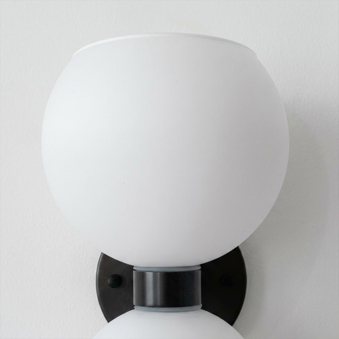 Mira wall sconces in a row along hallway warm even rhythm modern interior