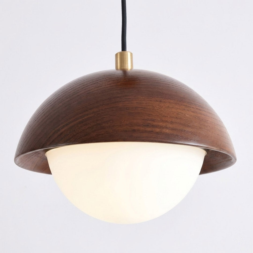 Mochi pendant hemispherical wood shade brass stem frosted glass diffuser close up Japanese minimalist craftsmanship detail