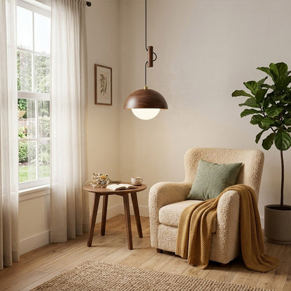 Mochi mini pendant hanging above reading armchair warm 3000K light cozy corner Japandi interior