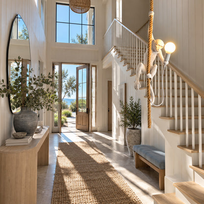 Monkey pendant light welcoming guests with a playful silhouette in an entryway