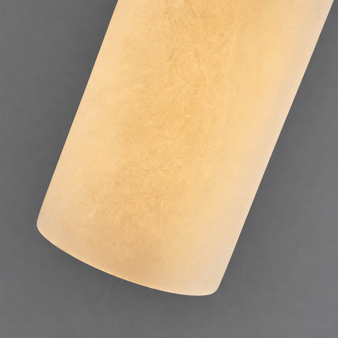 Monvela alabaster pendant light illuminated glowing veining warm soft radiance translucent stone detail close up quiet luxury