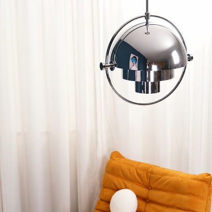 Small Emisfero hemisphere pendant light over a breakfast bar counter