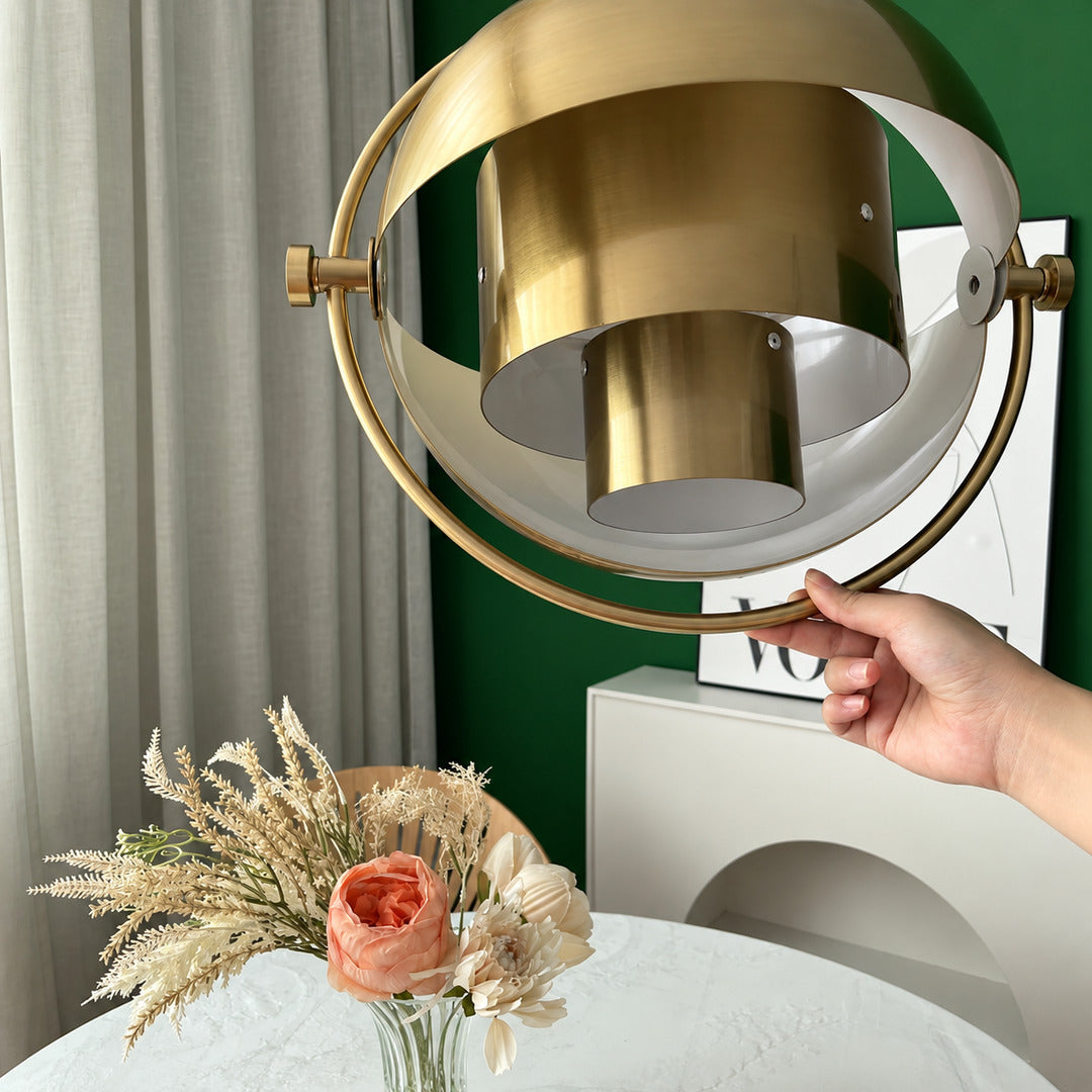 Small Emisfero hemisphere pendant light over a breakfast bar counter