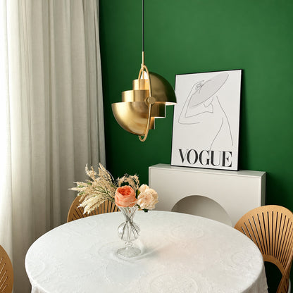 Small Emisfero hemisphere pendant light over a breakfast bar counter