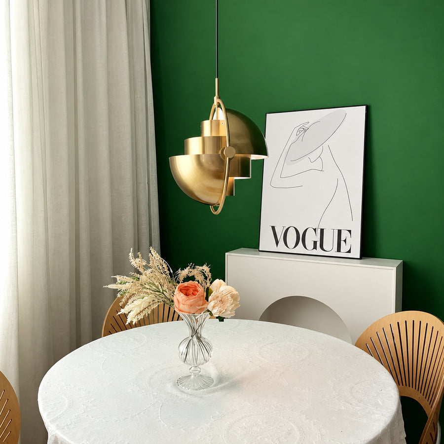 Small Emisfero hemisphere pendant light over a breakfast bar counter