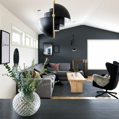 Emisfero hemisphere pendant light as a sculptural mid-century accent in a modern living room