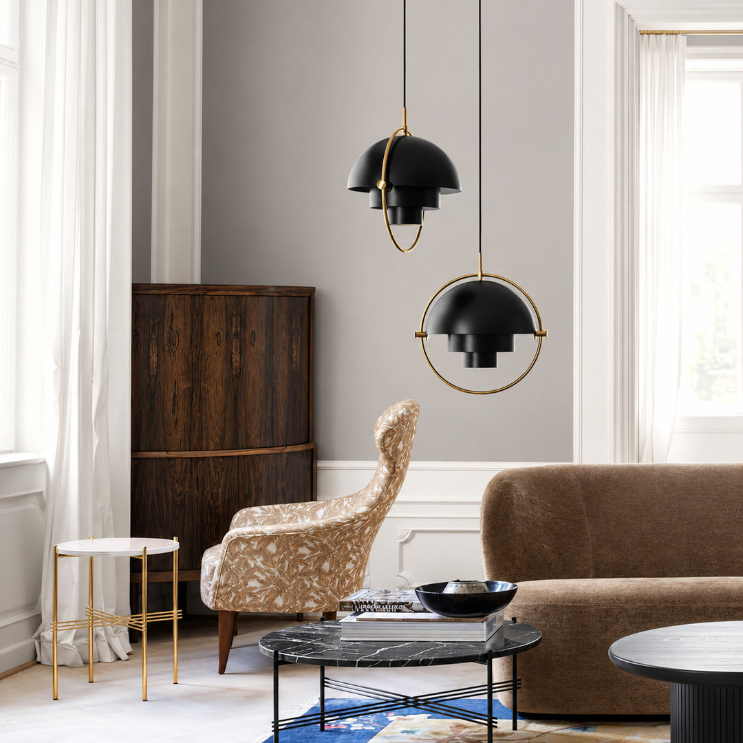 Small Emisfero hemisphere pendant light over a breakfast bar counter