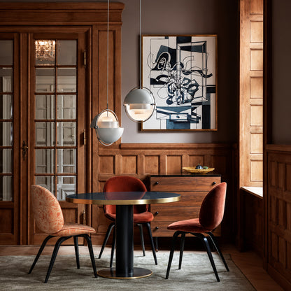 Small Emisfero hemisphere pendant light over a breakfast bar counter