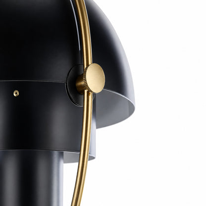 Close-up of the two movable metal hemispheres pivoting within the ring frame of the Emisfero pendant