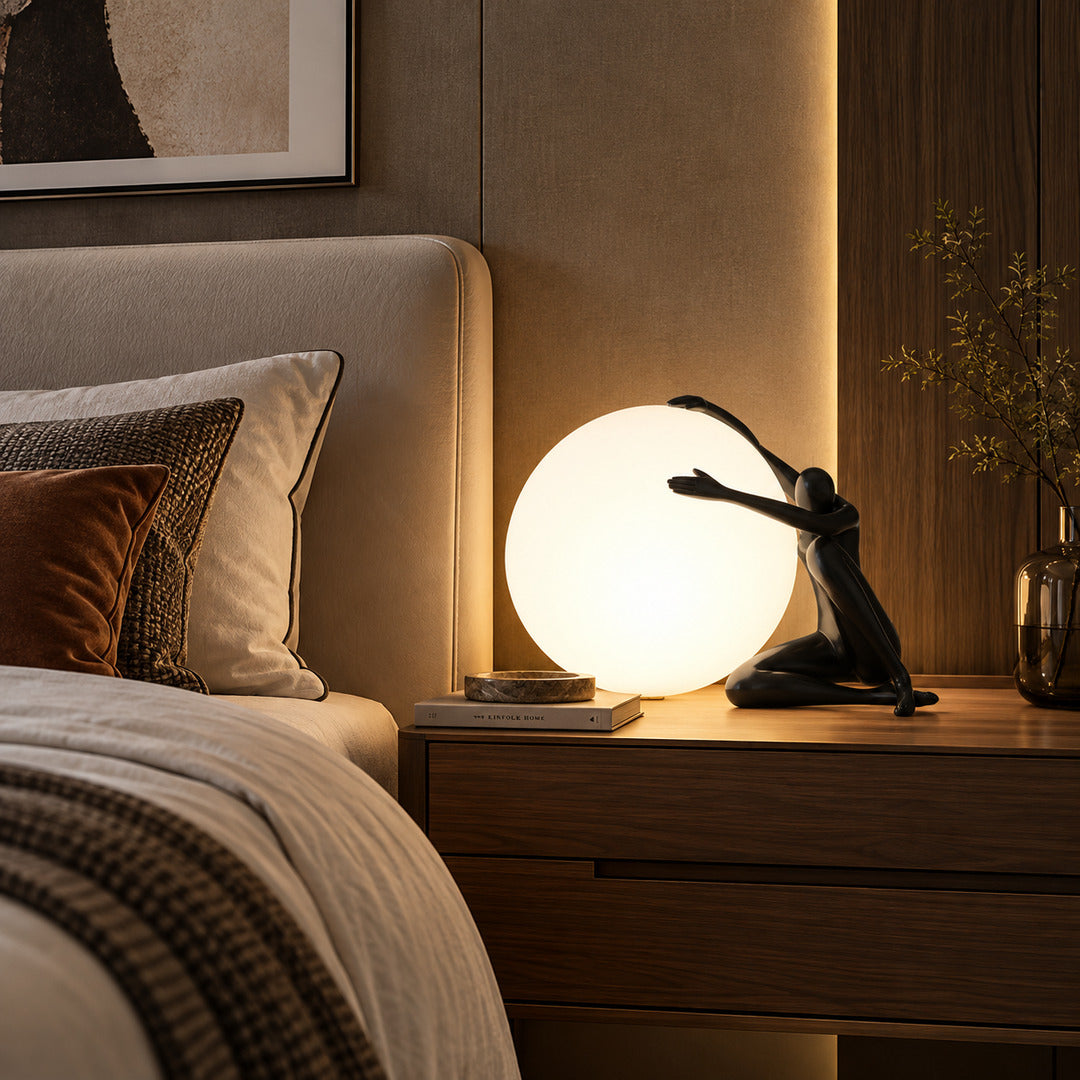 Musa sculpture table lamp as a sculptural accent on a bedroom nightstand
