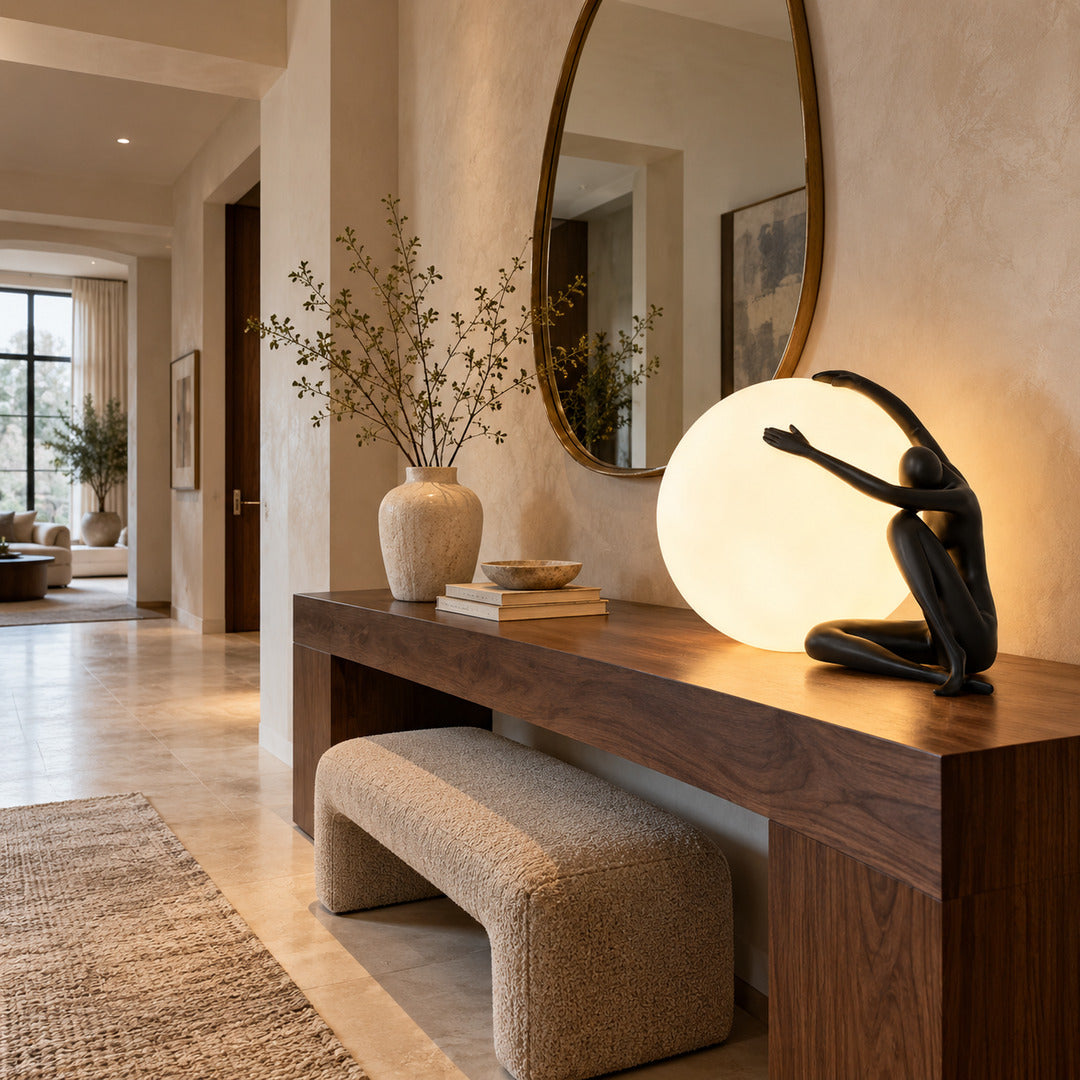 Musa sculpture table lamp welcoming guests on an entryway console
