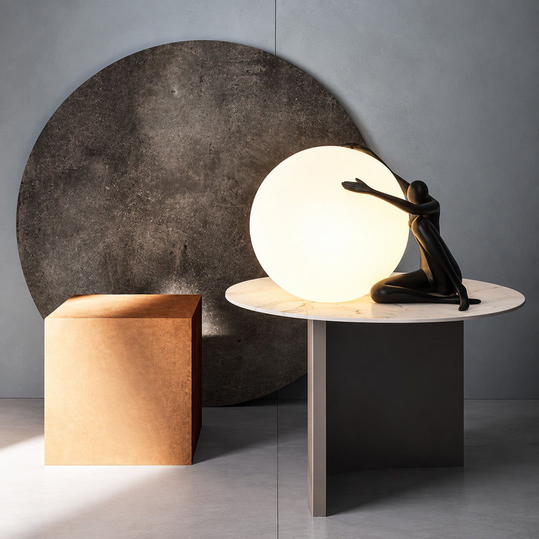 Musa sculpture table lamp adding ambient light on a dining room sideboard