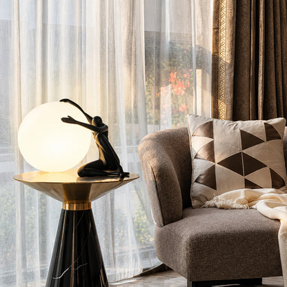 Musa sculpture table lamp as a sculptural focal point in a modern minimalist space