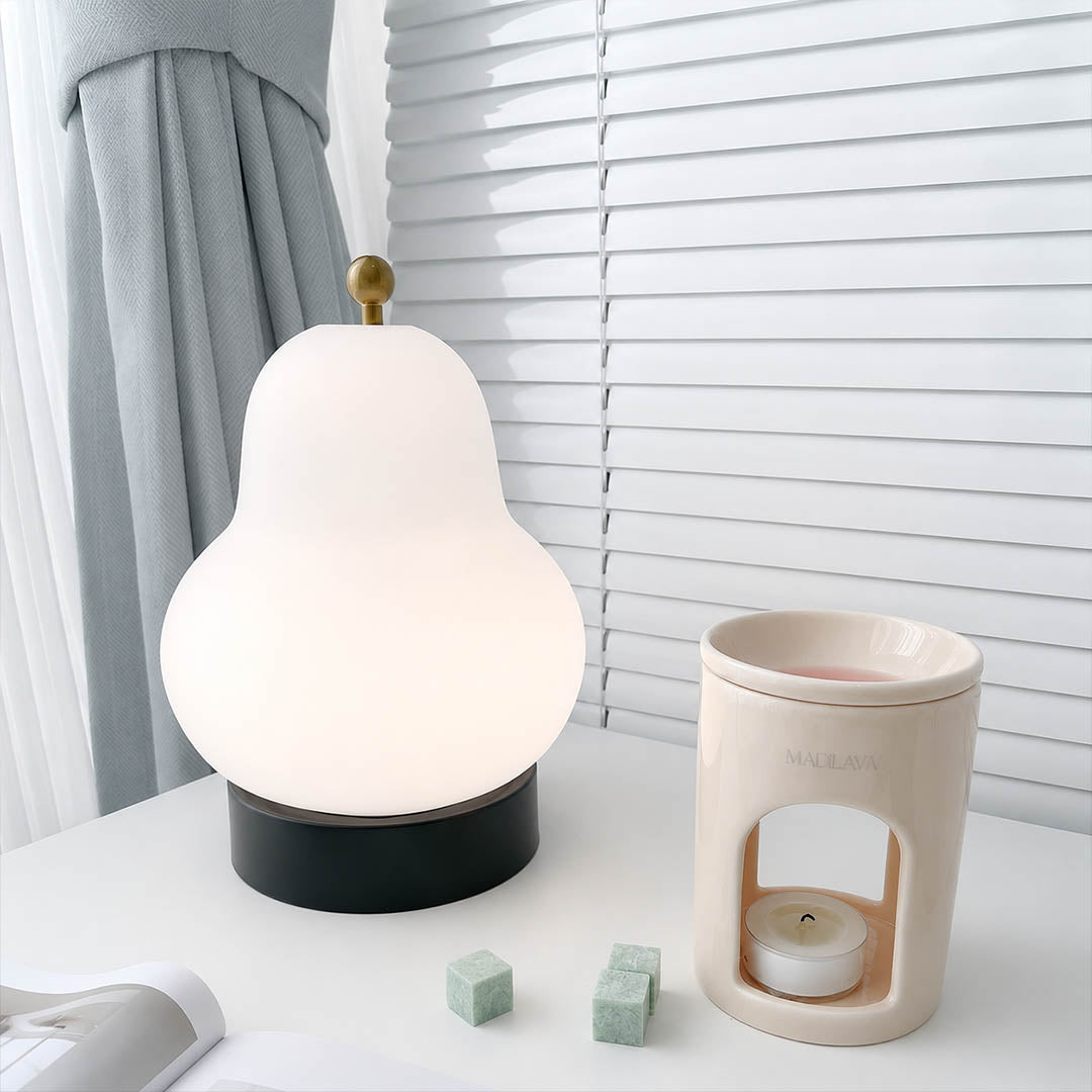 Nashi table lamp cordless portable outdoor patio balcony deck evening ambient warm glow no cord no plug pear shaped modern rechargeable lifestyle interior American home