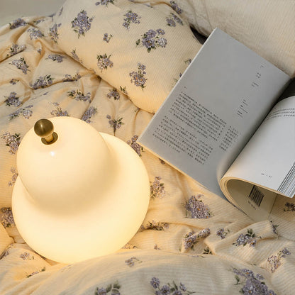 Nashi table lamp white modern primary bedroom bedside nightstand cordless USB rechargeable pear shaped warm ambient intimate no cord tangle safe lifestyle interior American home