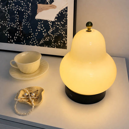 Nashi table lamp cream modern bedroom bedside reading warm 3000K glow cordless pear shaped USB rechargeable intimate cozy lifestyle interior American home