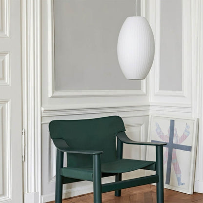 Nelson style bubble Pear pendant vertical hallway corridor entryway Mid Century modern compact tall narrow white glow interior