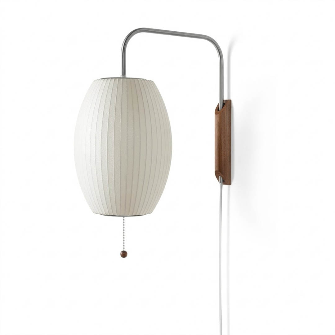 Nelson style bubble wall sconce Pear Model A 15 inch vertical elongated white polymer walnut wood arm plug in mid century white background
