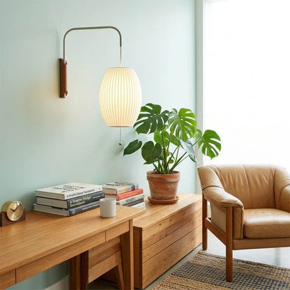 Nelson style bubble wall sconce reading corner armchair living room swivel adjustable mid century modern warm glow interior
