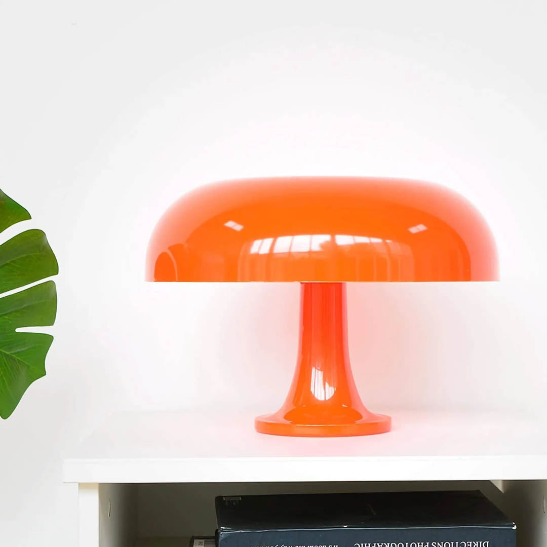 Nesso table lamp orange modern living room bookshelf accent 1965 Italian mushroom design icon Compasso d'Oro vibrant playful sophisticated collectible American home lifestyle interior