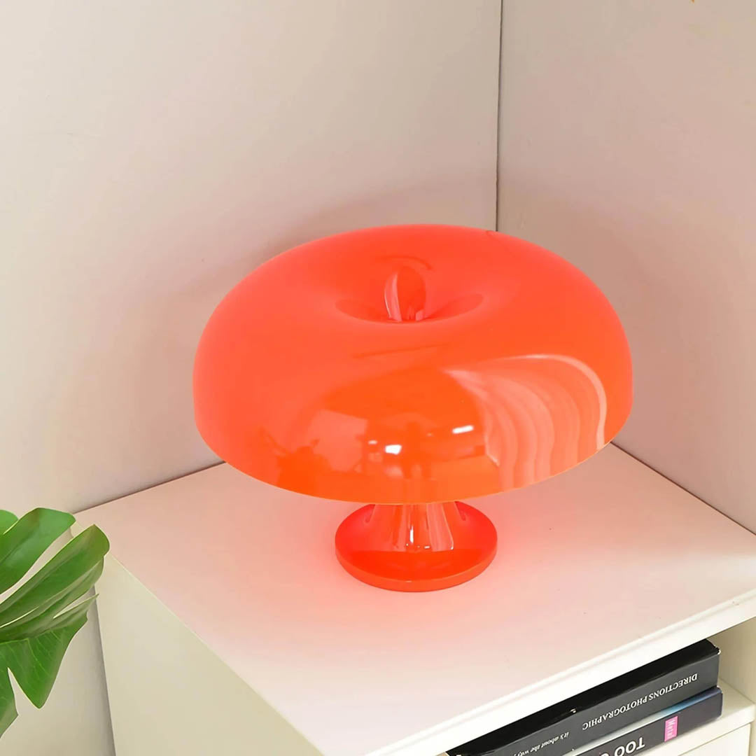 Nesso table lamp orange modern living room bookshelf accent 1965 Italian mushroom design icon Compasso d'Oro vibrant playful sophisticated collectible American home lifestyle interior