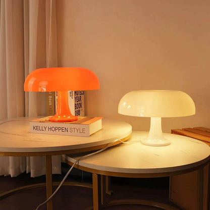 Nesso table lamp illuminated soft warm ambient glow evening bedside cozy mood 1965 Italian mushroom design icon Compasso d'Oro sophisticated intimate American home lifestyle interior