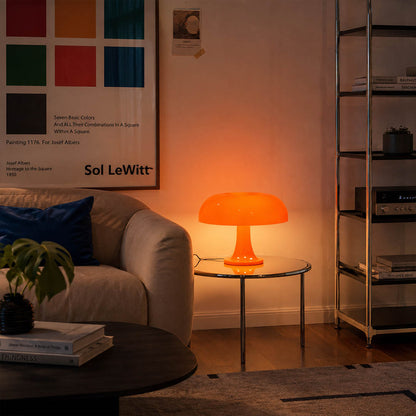 Nesso table lamp orange modern living room bookshelf accent 1965 Italian mushroom design icon Compasso d'Oro vibrant playful sophisticated collectible American home lifestyle interior