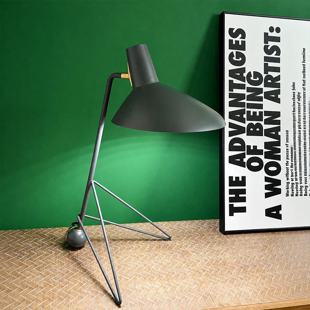 Nocta geometric metal table lamp matte metal finish surface texture detail close up modern industrial refined