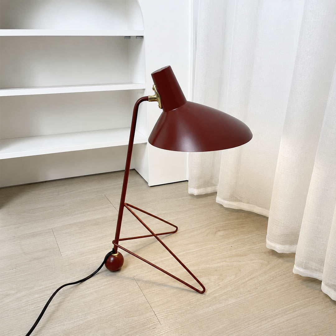 Nocta geometric metal table lamp matte metal finish surface texture detail close up modern industrial refined