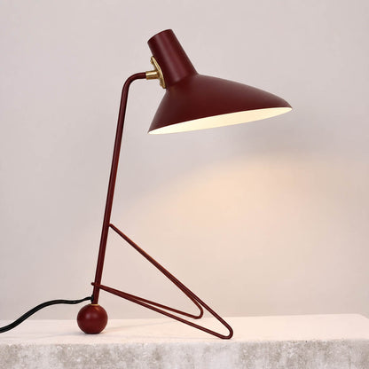 Nocta geometric metal table lamp matte metal finish surface texture detail close up modern industrial refined