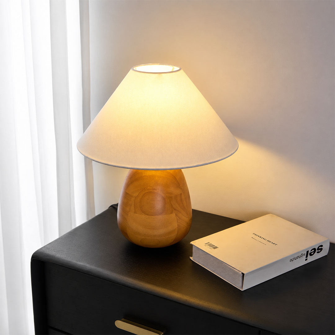Nord wood table lamp bedroom nightstand bedside warm glow natural wood white fabric rustic cozy American home lifestyle interior styled