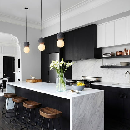 Norra Grey concrete mini pendant trio three lights above kitchen island modern industrial interior
